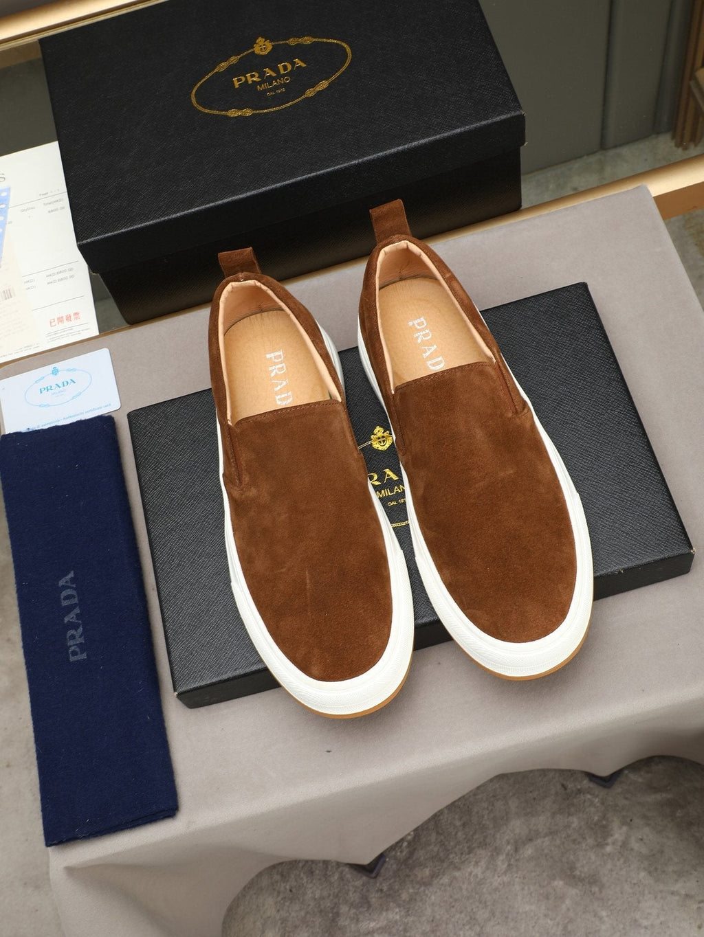 Prada Leather Slip-On Sneakers
